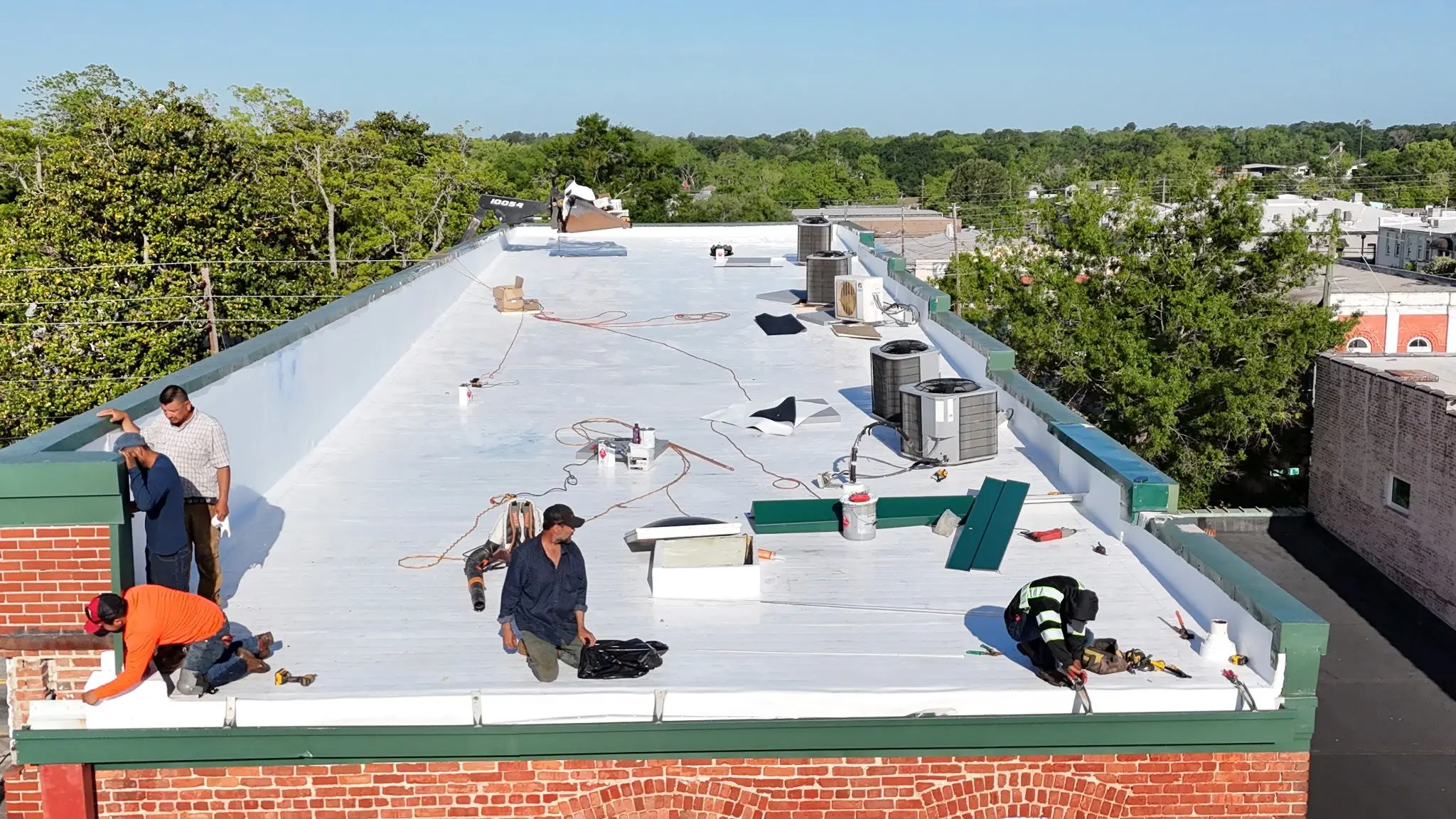 an image of a commercial roofing being fixed