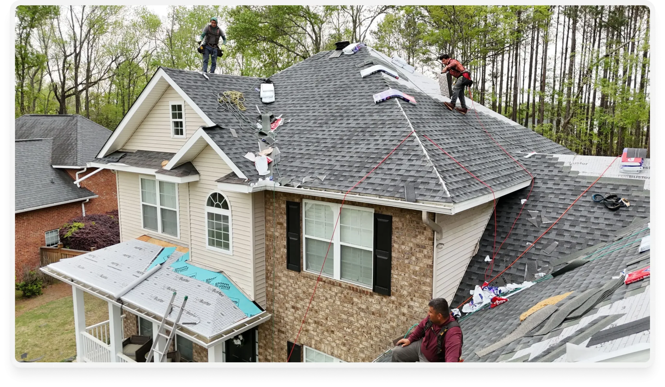 an image of a residential house of its roof being fixed - desktop tablet banner